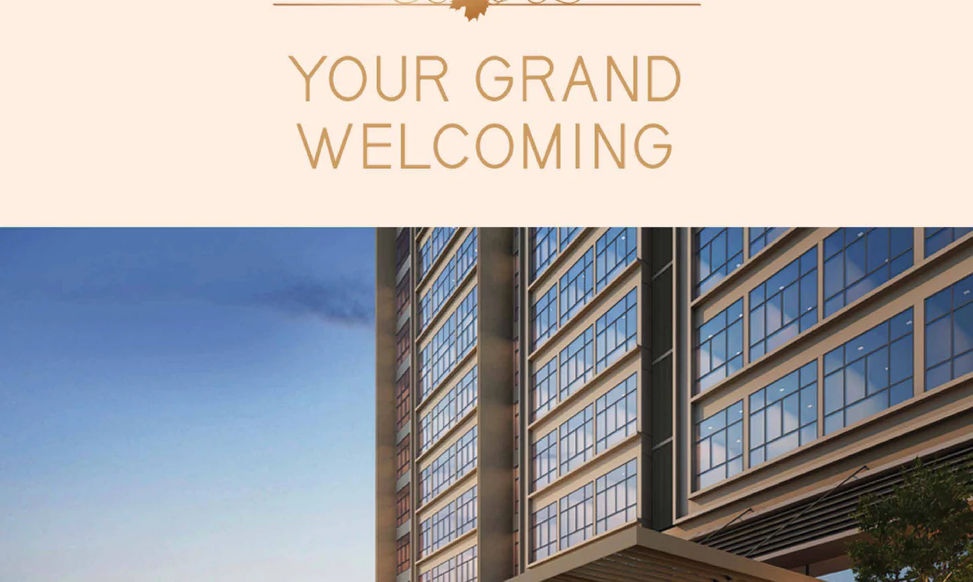 Grand arrival lobby and drop-off at The Maple Residences with double-height glazing and landscaping