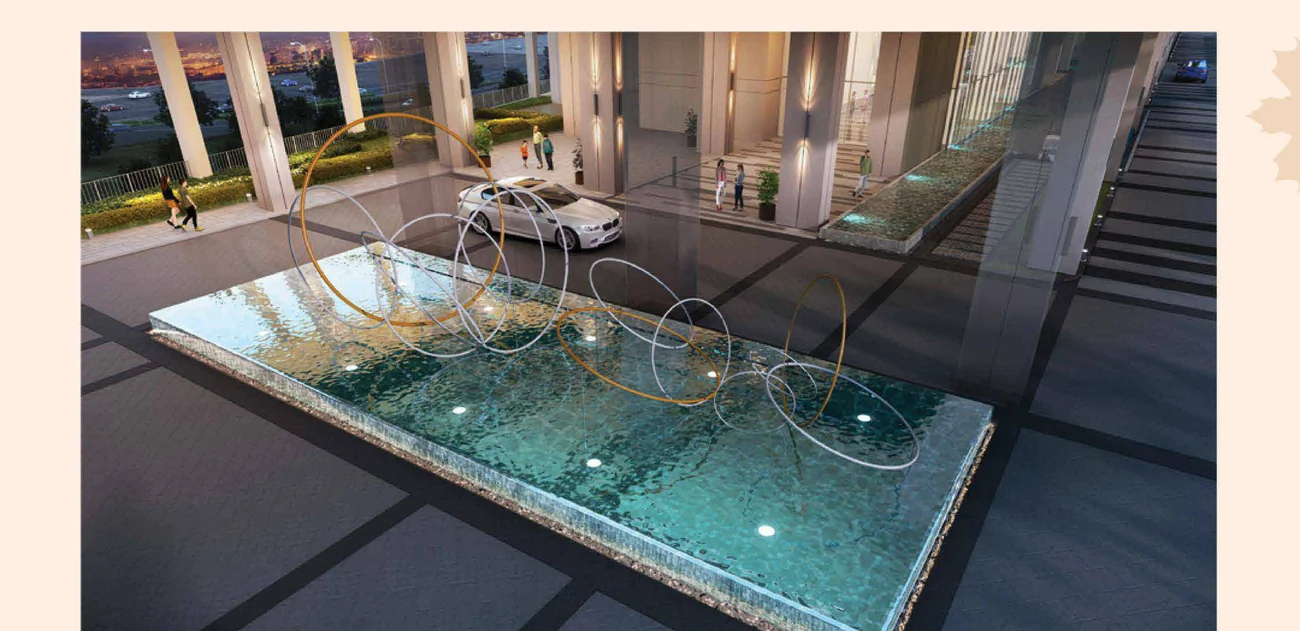 Water feature at the arrival drop-off of The Maple Residences